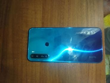 телефон fly selfie 1: Smartfon – mavi gövdə, damla formalı ön kamera kəsiyi olan tam ekranlı — 6