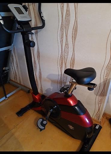 irsad electronics velosiped: Qırmızı və qara rənglərdə olan stasionar velotrenajor. Üzərində — 1