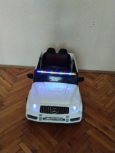 elekt: Uşaq üçün elektrikli avtomobil – ağ rəngdə Mercedes-Benz AMG G‑Class — 1