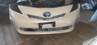 kamaz buferi: Ön, Toyota V Prius, 2014 il, Yaponiya, Ünvandan götürmə — 1