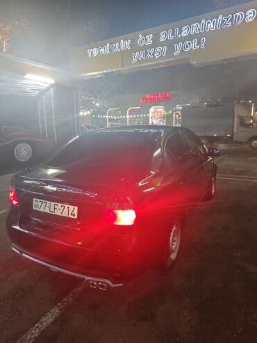 телефон держатель для автомобиля: Chevrolet Aveo: 1.4 л | 2010 г. 200 км Седан — 3