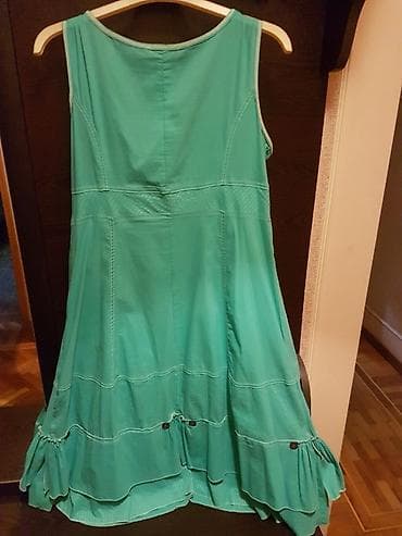 giyim: Sarafan. Türkiyə istehsalı. Ölçüsü - 44. Rəngi - firuzəyi. Qiyməti - — 6