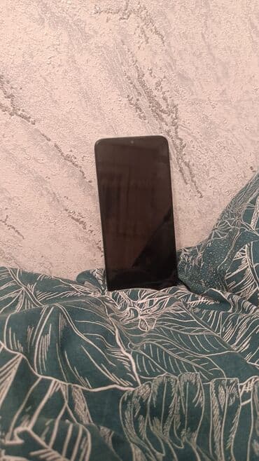 Toxunma ekranlı smartfon Xüsusiyyətlər: - Tam ekranlı ön panel