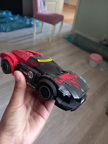 maraqli oyuncaqlar: LEGO tərzində yığılan Porsche yarış avtomobili modeli. Oyuncaq qara və — 1