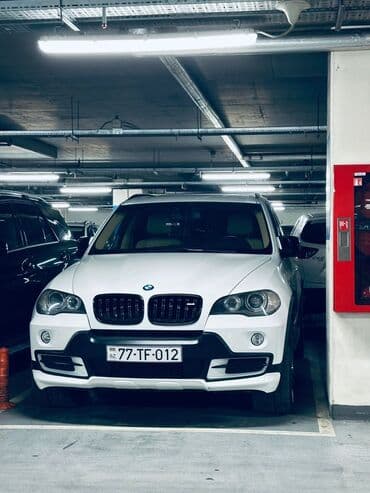 masin alram: BMW X5 (E70) – ağ rəngli, güclü və geniş krossover. Xarici: - Ağ — 1