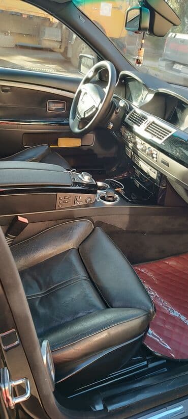 Audi: BMW 7 series: 4.8 л | 2006 г. Седан — 6