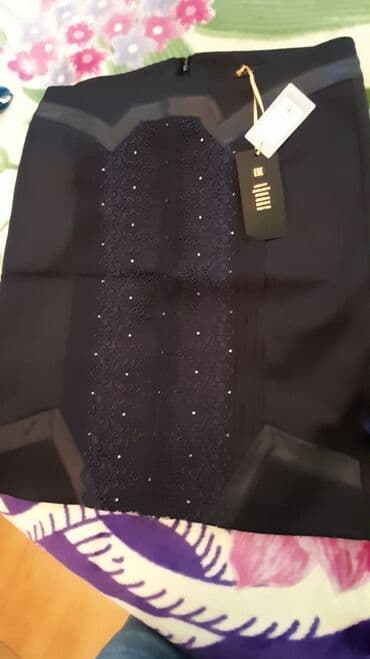 Tam yenidir, etiketlidir