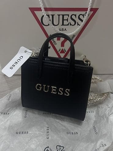 Çantalar: GUESS mini çanta.Original Guess markasidir.75 azn alinib 55 azn — 1