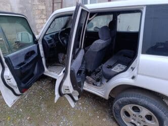 mtz 892 qiymeti: Mitsubishi Pajero IO – ağ rəngli, 5 qapılı kompakt SUV Maşının ancaq — 10