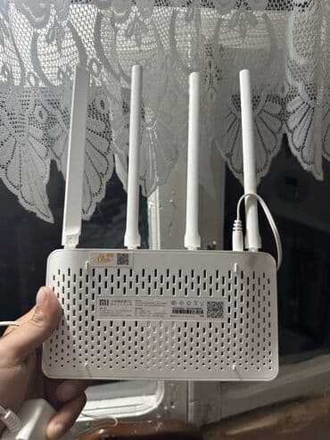 naxtel elaqe: Ağ rəngdə olan Xiaomi router, evdə və ya ofisdə internetə qoşulmaq — 4