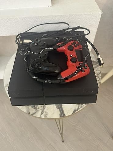 video reqistator: Məhsul: Sony PlayStation 4 (PS4) konsolu + 2 ədəd DualShock 4 pultu — 4