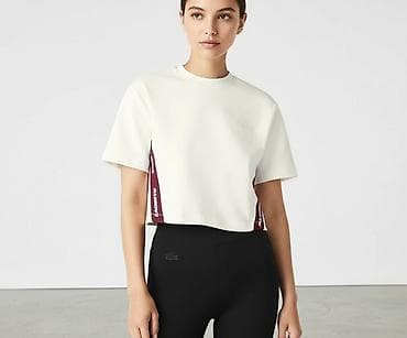 Original Lacoste qadın futbolkası, hediyyelik alinmishdi sadece