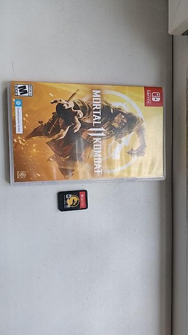 Nintendo Switch (neon mavi/qırmızı Joy‑Con) - Model: Nintendo Switch — 4