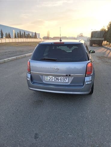 ucuz tofaş: Opel Astra H Caravan (universal), boz rəng. - Kuzov: 5 qapılı — 4