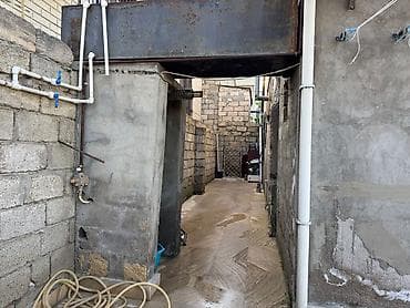 Bakixanovda munasib qiymete Anawqin terefde 1.8 sotda 3 otaqli orta — 10
