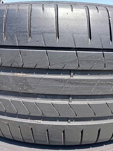 disk lada: 275/40/22 Almandan gelme Pirelli yay–yaypaq protektor naxışlı şinlər — 2