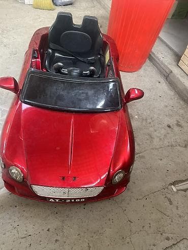 suru: Uşaq üçün elektrikli miniatür avtomobil – qırmızı rəngdə kabriolet — 1