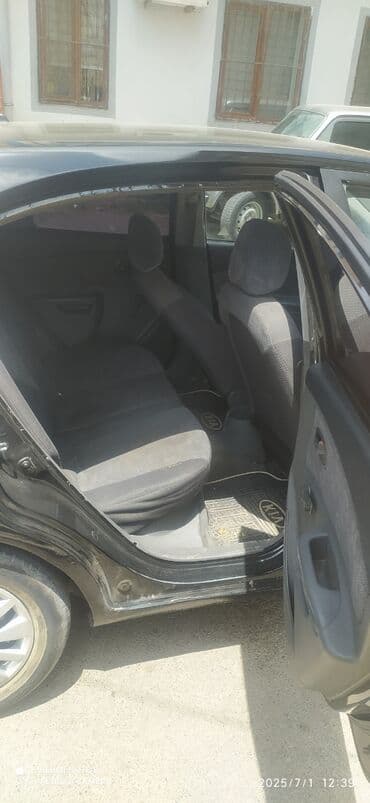 последующий выкуп авто бишкеке: Qara rəngdə olan Kia Rio avtomobili. Bu model şəhər daxilində rahat — 8