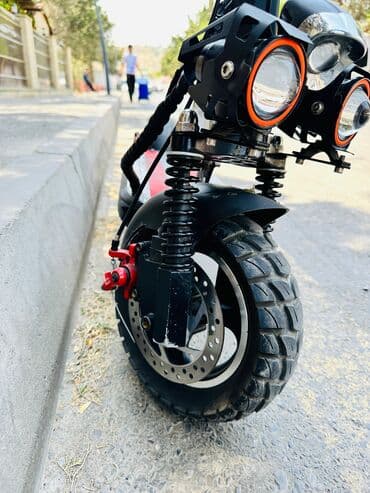 mopedlər elekdirikli: Kugo m4 pro bir sarjla 55kilo gider ve 60kmh suret kalxir.probeg 4000 — 4