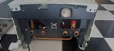 Tikinti daşları: Kombi 24kw 2esenjorlu tam ideal veziyyetdedi zemaneti var — 2