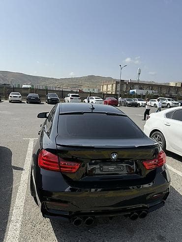 bmw e 36 coupe: BMW 4 Series Coupe – qara rəng, M‑paket üslubunda sport xarici görünüş — 1