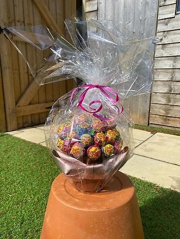 bayram papağı: Məhsul: Chupa Chups və Kinder konfet hədiyyə kompozisiyaları Təsvir: - — 3