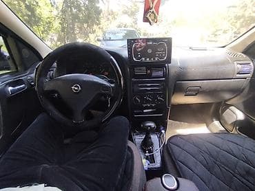 lada vaz 2101: Opel Astra: 1.6 l | 1999 il 400 km Sedan — 10
