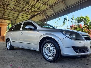 kia rio kreditle satisi: Opel Astra 1.3 turbo dizel (universal) – gümüşü rəngdə, 5 qapılı — 2