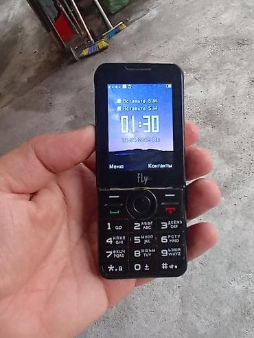 60 kv kondisioner: Düyməli mobil telefon – Philips Xenium seriyası (ön paneldə Fly — 3