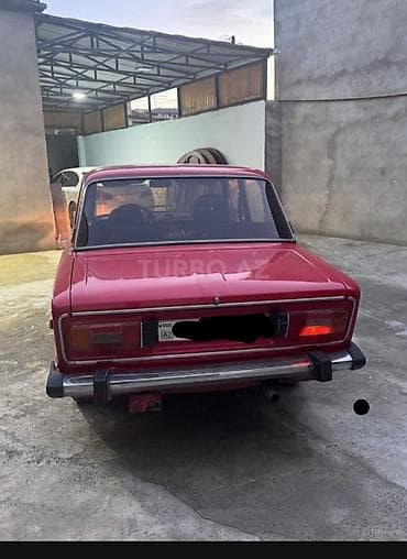 vito disk: VAZ 2106, qırmızı rəngli sedan. Xüsusiyyətlər: - Kuzov: 4 qapılı — 2