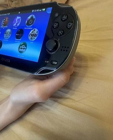 bluetooth qulaqciq: Sony PlayStation Vita (PS Vita) əl konsolu Xüsusiyyətlər: - Model — 4