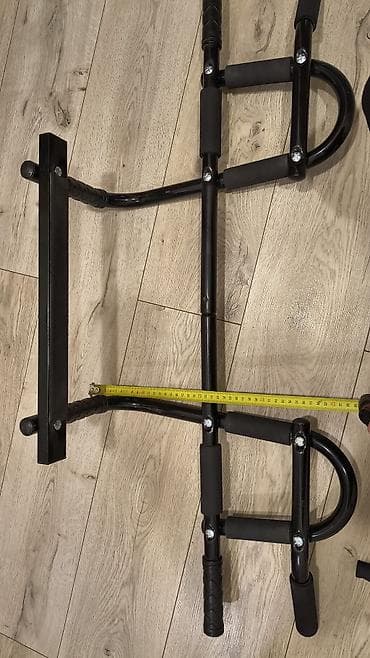 gitara satilir: Turnik. qapının üst hissəsinə keçirilən. satışda 170 manatadır. evdə — 4