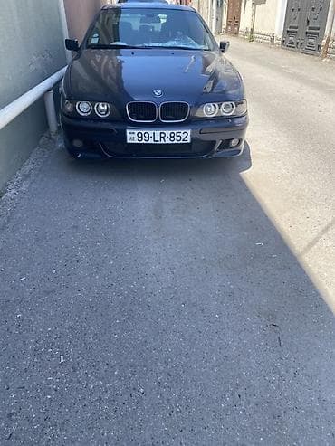 prius c: BMW 528: 2.8 l | 1998 il Sedan — 1