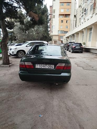 masin elani: Nissan Primera: 0.2 l | 1998 il Sedan — 5