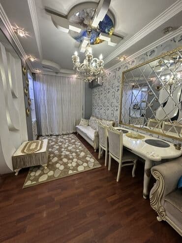 qara qarayev: Mətbəx hissəsində ağ rəngli modul mebellərlə təchiz olunmuş, qara — 2