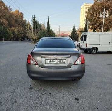 hundayi santa fe: Nissan Almera (sedan), boz rəng. Texniki xüsusiyyətlər: - Benzin — 4