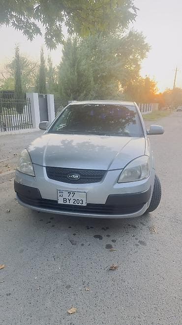 авто volkswagen: Kia Rio: 1.4 л | 2005 г. Хэтчбэк — 2