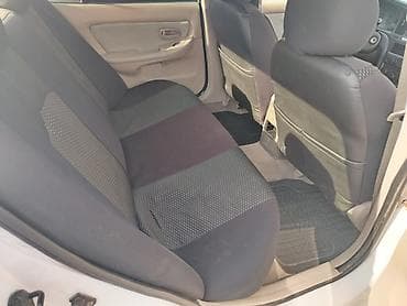 tap az prius: Hyundai Elantra: 2 l | 2004 il Sedan — 8