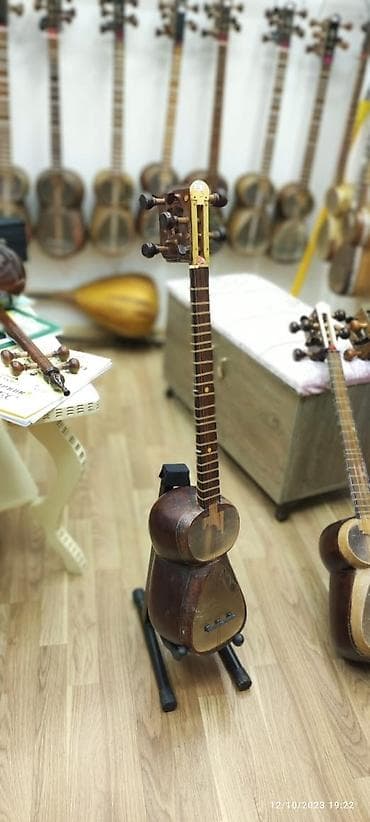 ucuz gitara satisi: Tar Rast musiqi alətləri Mağazasınin unvanlari; 1) Əhmədli Neapol — 1