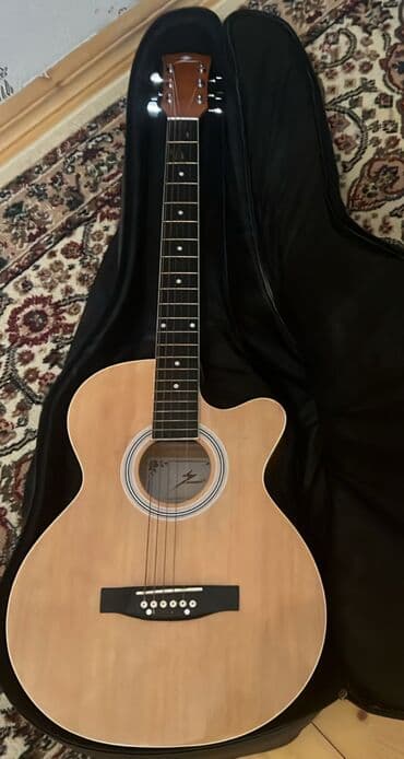 Çaydanlar: Akkustik gitara – cutaway (yan kəsikli) korpus dizaynı - Korpus: təbii — 1