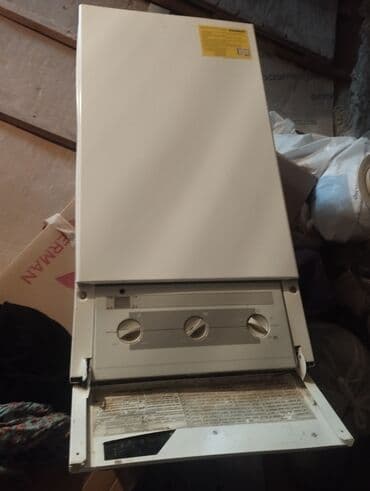 Demirdöküm Miniterm modeli qazan. Divara quraşdırılan bu ağ rəngli