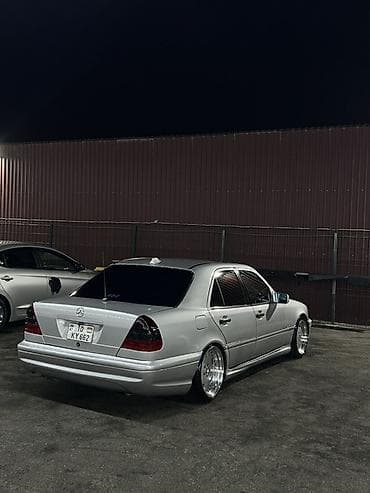 bmw e36 angel: Mercedes-Benz C-Class: 2.3 l | 1998 il Sedan — 1