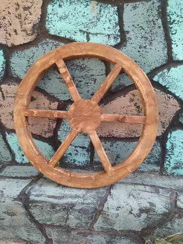 Xalçalar: Dekorativ araba təkəri əl işçiliyi ilə şam ağacından hazırlanıb — 1