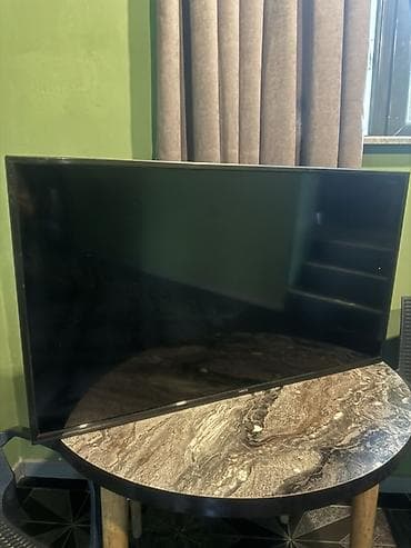 100 cc mator: Televizor Neos LED ekran 40" — 2