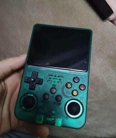 Retro portativ oyun konsolu - Şəffaf yaşıl korpus, cib ölçüsündə