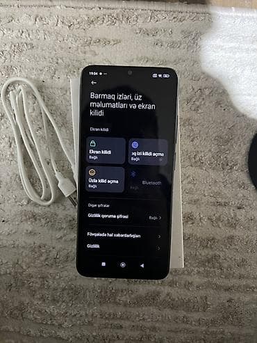 telfonlar yeni: Redmi 12C, 128 GB, rəng - Qara, Barmaq izi — 8
