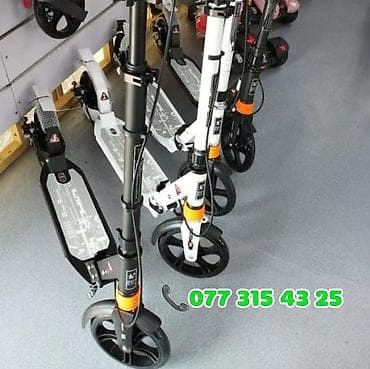 Şəhərdaxili rahat hərəkət üçün yığcam alüminium skuter. Çatırlma