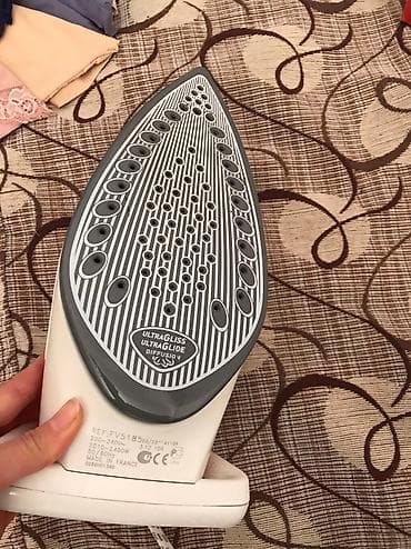 Original Tefal ütü 250 aznə alınıb yerə düşüb qırmızı yeri azca sınıb