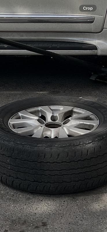avtomobil barter: Toyota orijinal yüngül lehimli disk və şin komplekti. - Disk: Toyota — 1