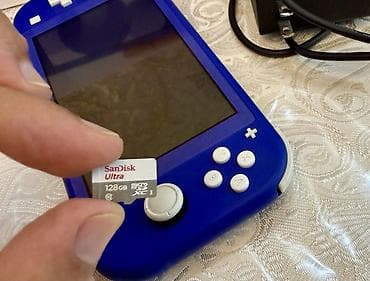 oyun qulaqciqi: Nintendo Switch Lite 
İdeal vəziyyətdə
Üstündə 128 gb yaddaş kartı — 2